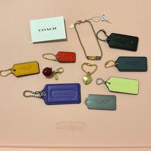 Coach new York bundle of leather tags a bracelet and charms all new